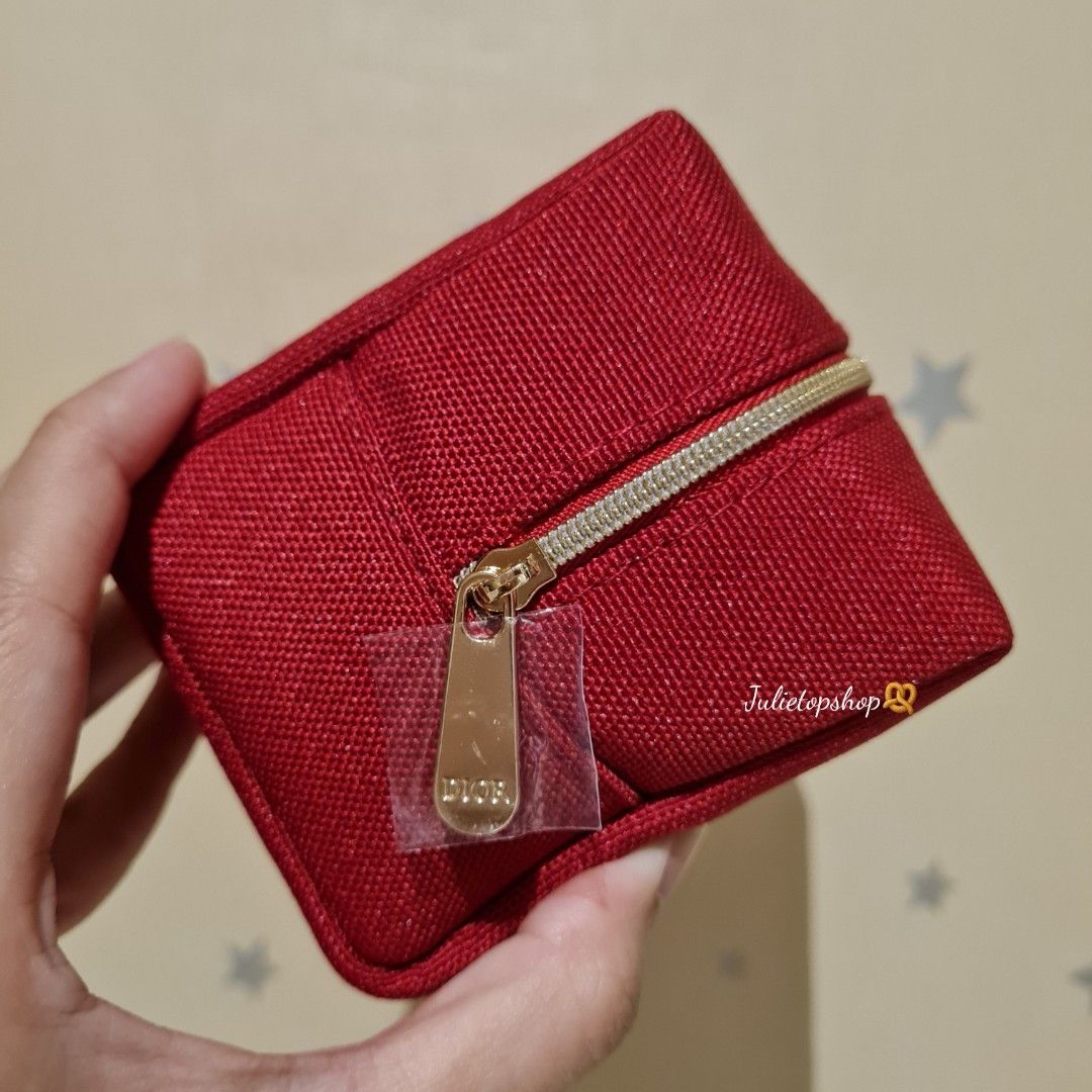 CD Dior Beaute Red Holiday Pouch (Category: Accessories) located in Kuala Lumpur. Submitted by julietopshopbackup (Listing ID 1449712825, Image 2). Description: Brand new Brand : As advertised Colour : Red Material : 100% Polyester Hardware : Gold Measures : L 14cm x H 9cm x W 9cm 🪧Description; Very popular & perfect for travel/beach designed to hold small accessories and beauty essentials All items listed are authentic and genuine. We are not a