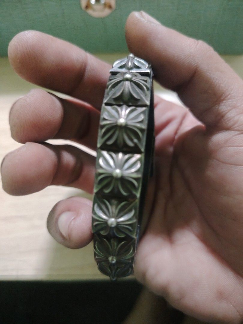 Chrome Hearts Style Leather Bracelet (Category: Bracelets) located in Caloocan City. Submitted by JapanGemsandTreasure (Listing ID 1449709562, Image 2). Description: This Chrome Hearts Pyramid Stud Bracelet features sterling silver pyramid-shaped studs on a black leather band.Material: .925 Sterling Silver and genuine leather.Design: A single row of studs, often featuring a cross emblem on top.Condition: Typical used items may show scratches and 