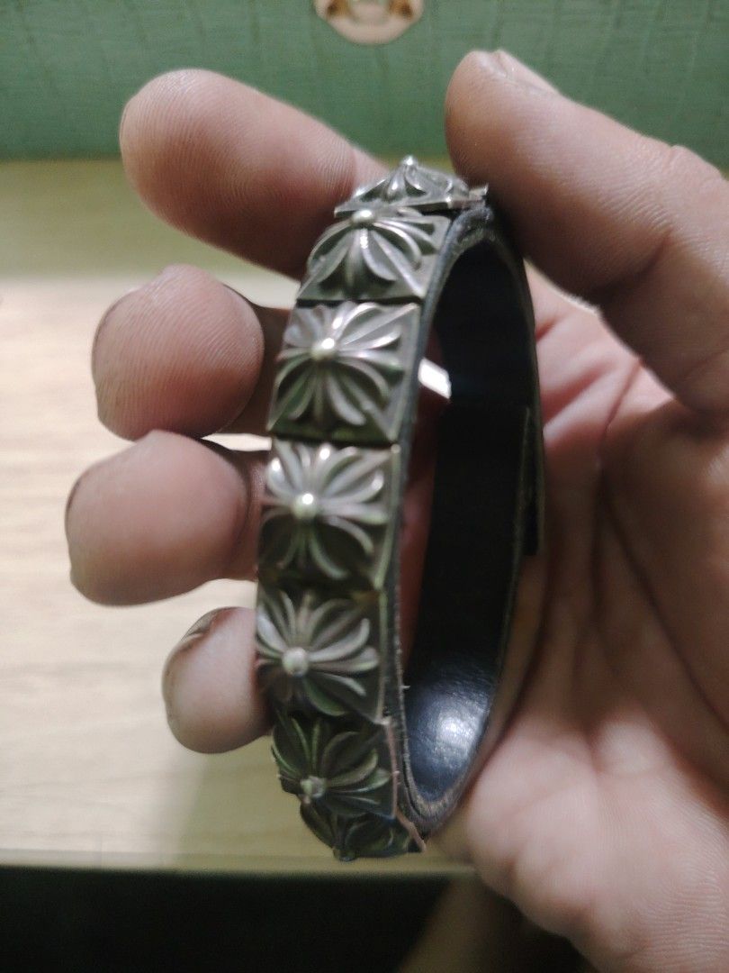 Chrome Hearts Style Leather Bracelet (Category: Bracelets) located in Caloocan City. Submitted by JapanGemsandTreasure (Listing ID 1449709562, Image 1). Description: This Chrome Hearts Pyramid Stud Bracelet features sterling silver pyramid-shaped studs on a black leather band.Material: .925 Sterling Silver and genuine leather.Design: A single row of studs, often featuring a cross emblem on top.Condition: Typical used items may show scratches and 