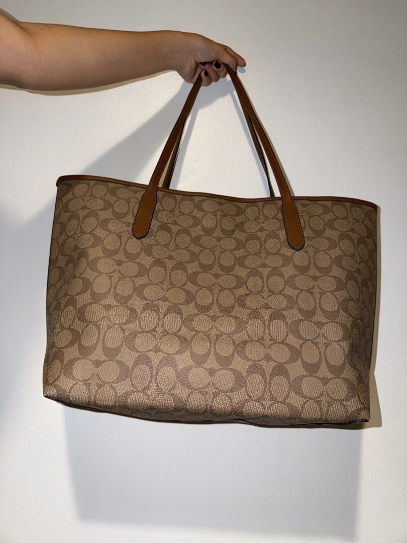 BN Tote Bag Coach in brown (Category: Tote Bags) located in Tanza. Submitted by shop.yvone (Listing ID 1449638034, Image 2). Description: BN Tote Bag Coach in brown Coach City Tote in Signature Canvas Style Number: 5696 Exterior: body of the bag is made from PVC (polyvinyl chloride) coated canvas Dimensions: Approximately 13” (L) x 11.5” (H) x 6.25” (W) - new, never been used - ordered this from pasabuy (JP) Transaction details: Price: ₱5290 Meet