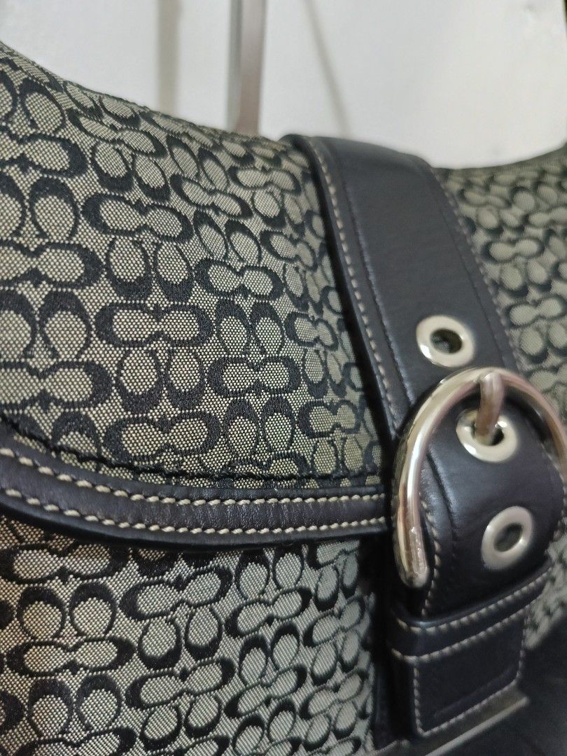 Coach Soho F10926 Black Medium (Category: Luxury Bags & Wallets) located in Tagum. Submitted by reyz.18 (Listing ID 1449590602, Image 3). Description: •Canvas and inner lining are in good condition •Flaws in strap as it is cracked and has tears •Has hairlines in strap rubber lining and bit damaged rubber lining on the side flap •Hardware is 6/10 •Has creed, hangtag,ykk zip, dustbag •RANK AB •Guranteed authentic •All is good except for strap, rubb
