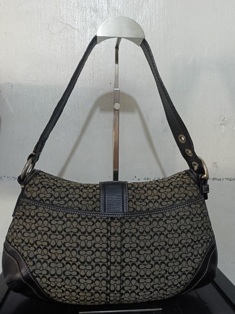 Coach Soho F10926 Black Medium (Category: Luxury Bags & Wallets) located in Tagum. Submitted by reyz.18 (Listing ID 1449590602, Image 2). Description: •Canvas and inner lining are in good condition •Flaws in strap as it is cracked and has tears •Has hairlines in strap rubber lining and bit damaged rubber lining on the side flap •Hardware is 6/10 •Has creed, hangtag,ykk zip, dustbag •RANK AB •Guranteed authentic •All is good except for strap, rubb