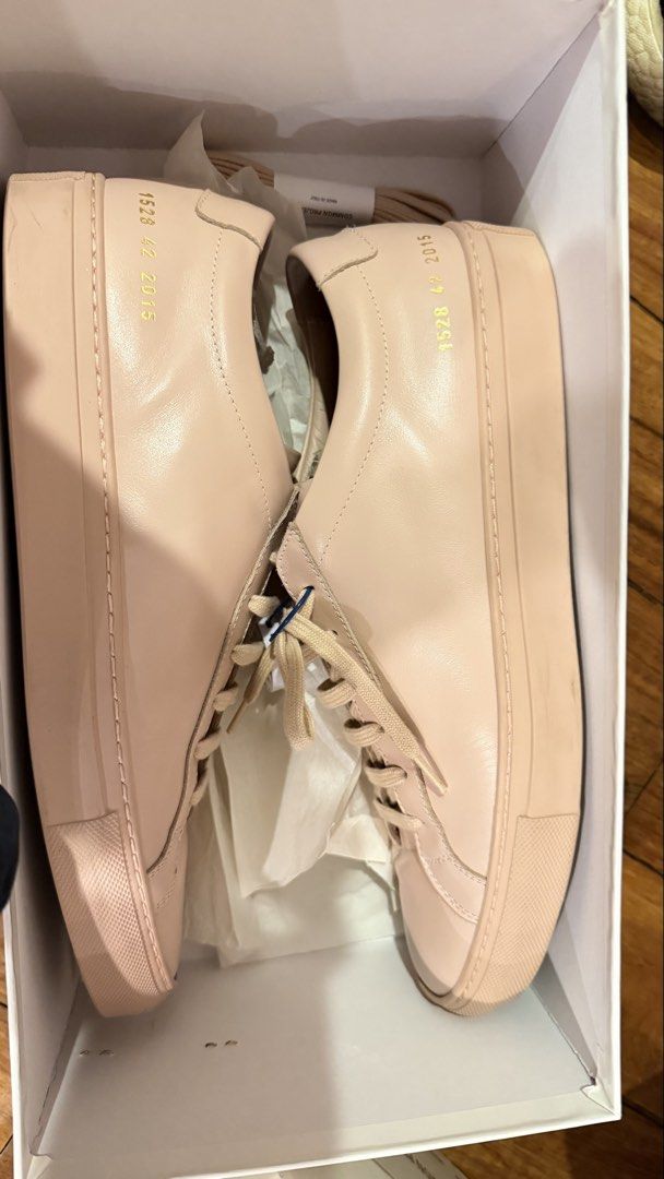 Common Projects Men Achilles Low Blush Leather Sneakers Size 42 (Category: Sneakers) located in Taguig. Submitted by cmcloset77 (Listing ID 1449659806, Image 1). Description: - Brand: Common Projects - Model: Achilles Low - Color: Blush Pink - Size: 42 (EU) - Origin: Made in Italy -with extra lace and dust bag - Condition: Pre-owned, slightly used - Includes: Original box and authenticity guarantee card.