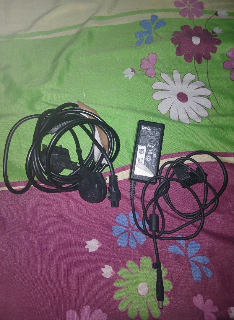 Dell laptop charger (Category: Chargers) located in Cavite. Submitted by steve_finds (Listing ID 1449540192, Image 2). Description: No issue Working Via Lalamove/J&T or Pick up.