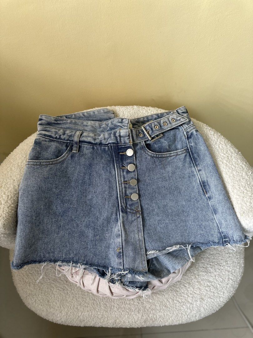 Denim Skort with Belt Detail (Category: Skirts) located in Bulacan. Submitted by milobearrr (Listing ID 1449624018, Image 1). Description: Tattered skort W: 27-29 L: 13 Tattered hard denim w/ adjustable belt 169php.