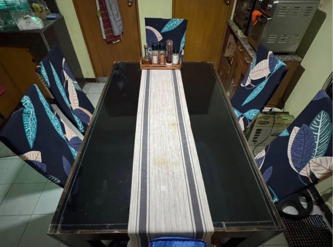 Dining Table with 6 Chairs and Chair Covers (Category: Tables & Sets) located in Quezon City. Submitted by akocwelen74 (Listing ID 1449599566, Image 1). Description: - Dining table set with 6 chairs bought in Mandaue in 2022 One chair with crack - Ideal size for small dining areas - Message us if you're interested!.