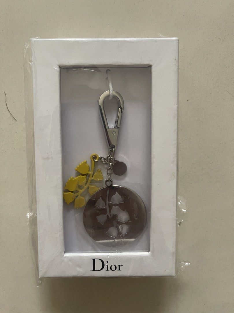 Dior Bee Key Holder Charm (Category: Luxury Accessories) located in Quezon City. Submitted by kingcurator (Listing ID 1449581247, Image 3). Description: - Authentic Dior bee key holder - Includes a small yellow charm - Original packaging included - Purchased in Paris - Ideal for gifting or personal use.