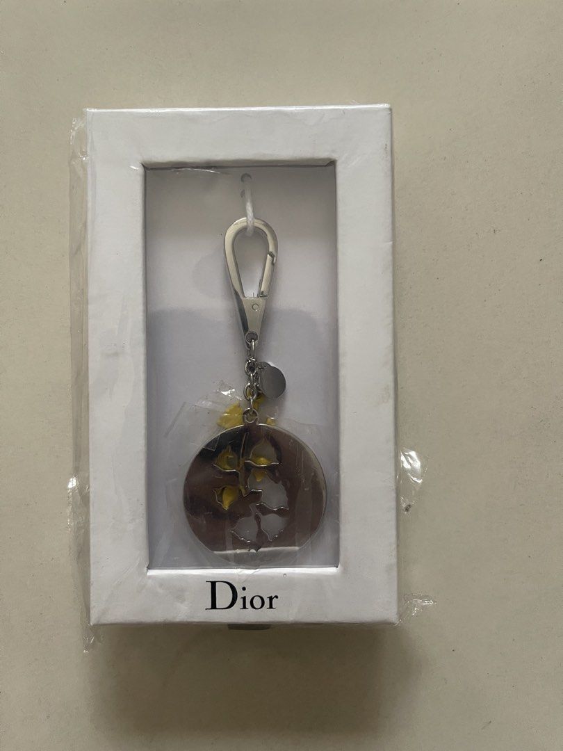 Dior Bee Key Holder Charm (Category: Luxury Accessories) located in Quezon City. Submitted by kingcurator (Listing ID 1449581247, Image 1). Description: - Authentic Dior bee key holder - Includes a small yellow charm - Original packaging included - Purchased in Paris - Ideal for gifting or personal use.