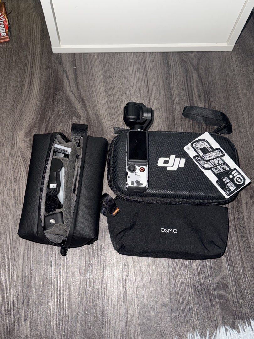 DJI Osmo Pocket 4 Creator Combo with Accessories (Category: Video Cameras) located in Imus. Submitted by mrdezz (Listing ID 1449736493, Image 1). Description: DJI Osmo Pocket 4 Creator Combo - Ideal for vlogging and travel content creation - Comes with the Osmo Pocket camera and its gimbal - Includes essential accessories: microphone, tripod, and charging adapter - All items fit neatly into included carrying cases - Selling due to an upgrade - Fe