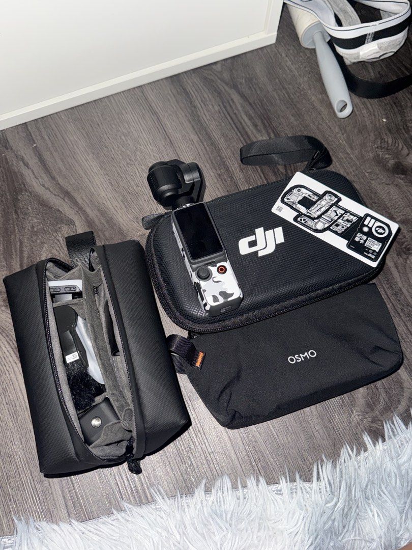 DJI Osmo Pocket 4 Creator Combo with Accessories (Category: Video Cameras) located in Imus. Submitted by mrdezz (Listing ID 1449736493, Image 2). Description: DJI Osmo Pocket 4 Creator Combo - Ideal for vlogging and travel content creation - Comes with the Osmo Pocket camera and its gimbal - Includes essential accessories: microphone, tripod, and charging adapter - All items fit neatly into included carrying cases - Selling due to an upgrade - Fe