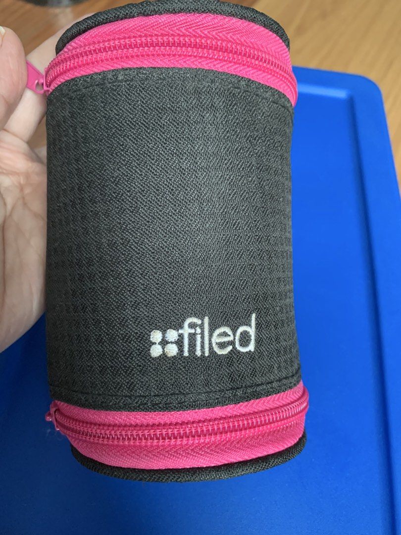 Filed Pencil Case Holder Pouch (Category: Stationery & School Supplies) located in Quezon City. Submitted by faststone.ba186f (Listing ID 1449569457, Image 1). Description: - Cute cylindrical pencil case from Filed. - Black exterior with bright pink zipper and lining. - Internal dividers for organization. - Ideal for pens, pencils, or small makeup items. - Compact and easy to carry..