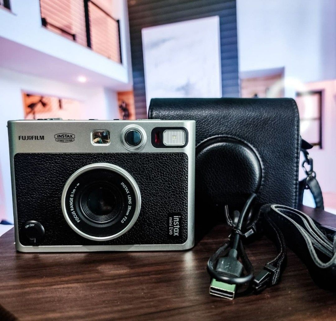 Fujifilm Instax Mini Evo Instant Camera with Case (Category: Cameras) located in Quezon City. Submitted by j.mrrn (Listing ID 1449687849, Image 2). Description: No issues fully functional. With newly bought film for testing for sure buyer. Cosmetics 10/10 Performance 10/10 Inclusions: Camera bag Original strap Original Charger SD Card 16gb with screen protector : Camera screen - Tempered film Camera lens - Hydrogel film.