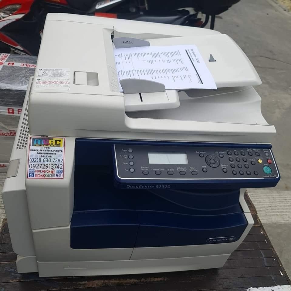 FUJIXEROX DOCUCENTRE S2320 (Category: Printers, Scanners & Copiers) located in Caloocan City. Submitted by mcfc_angel (Listing ID 1449555500, Image 2). Description: FOR CASH ONLY ‼️‼️ ✨FUJIXEROX DC S2320 ( REPURBISHED )✨ ✅ ID Card Copying ✅ Network Colour Scanning ✅ 23 ppm ✅ UP to A3, 11 X 17" Size ✅ Auto Back to Back ➡️ COPY,PRINT,SCAN ✅ Smart Print-sort Function ✅ 1 tray with Bypass Tray ✅ COPY , PRINT , SCANNER ✅ Eco & Workplace Friendly.
