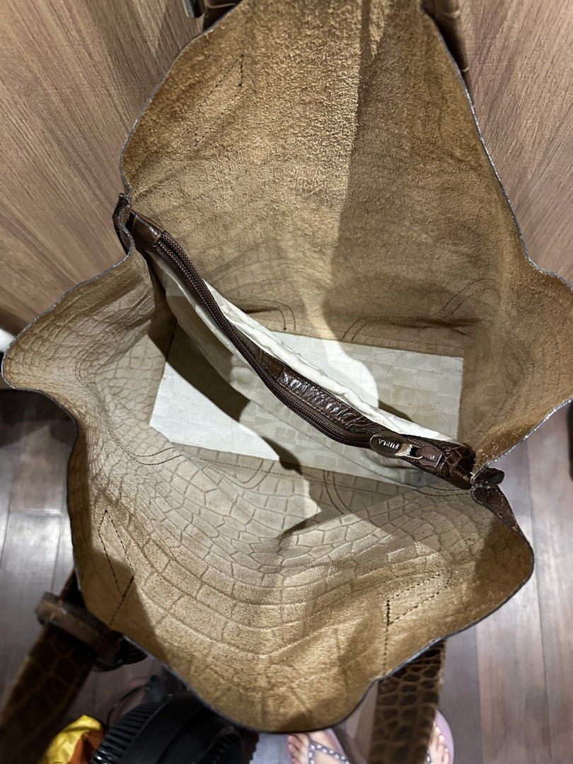 Authentic Furla Jucca Bag in Brown Leather (Category: Luxury Bags & Wallets) located in Makati City. Submitted by sarahgscloset (Listing ID 1449541392, Image 3). Description: - Well-loved authentic Furla Jucca Tote - Bought in Spain back in 2016 - Comes with Dust Bag - Price is negotiable RFS: Decluttering.