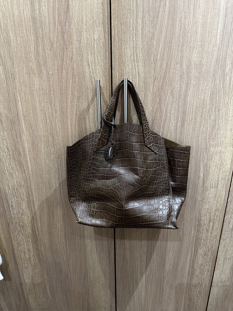 Authentic Furla Jucca Bag in Brown Leather (Category: Luxury Bags & Wallets) located in Makati City. Submitted by sarahgscloset (Listing ID 1449541392, Image 1). Description: - Well-loved authentic Furla Jucca Tote - Bought in Spain back in 2016 - Comes with Dust Bag - Price is negotiable RFS: Decluttering.