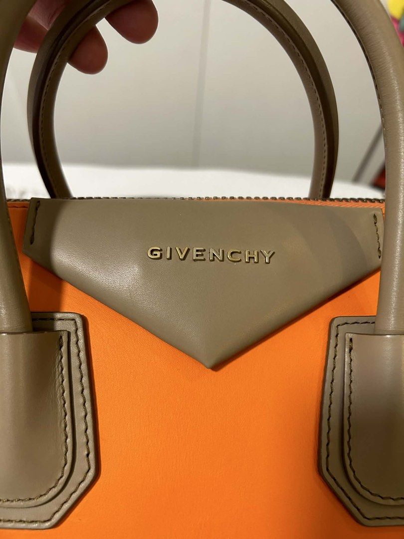 Givenchy Orange Leather Nightingale Bag (Category: Luxury Bags & Wallets) located in Cavite. Submitted by gabrielmontalban (Listing ID 1449634293, Image 3). Description: - Authentic Givenchy Nightingale bag - Vibrant orange leather with tan handles and trim - Comes with original dust bag - Ideal for everyday use, spacious and stylish.