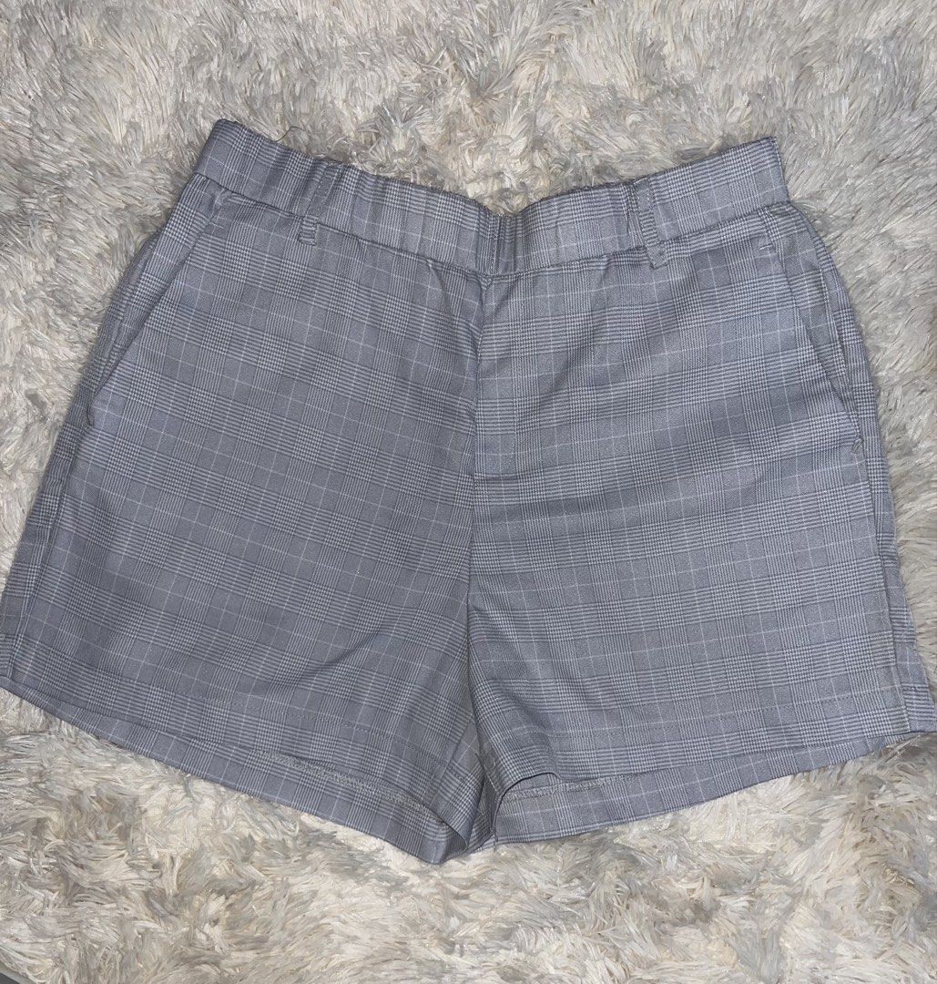 Grey Plaid Elastic Waist Shorts (Category: Shorts) located in Taguig. Submitted by mafrd (Listing ID 1449632498, Image 1). Description: - Cute grey plaid shorts - Comfortable elastic waistband - Functional side pockets - Perfect for casual wear or styling up - Easy to pair with t-shirts or blouses Size 32.