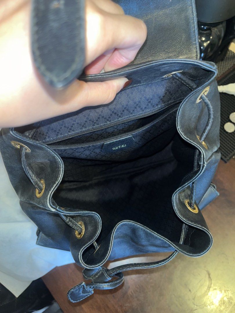 Gucci 2000s Vintage Bamboo Leather Backpack (Category: Backpacks) located in Manila. Submitted by lexa_villanueva (Listing ID 1449551465, Image 3). Description: Highlights: - black - leather - bamboo top handle - two front flap pockets - buckle-fastening front flap - drawstring fastening - adjustable shoulder straps - internal zip-fastening pocket - gold-tone hardware - Condition: GOOD. This previously owned and used item is in good condition wit