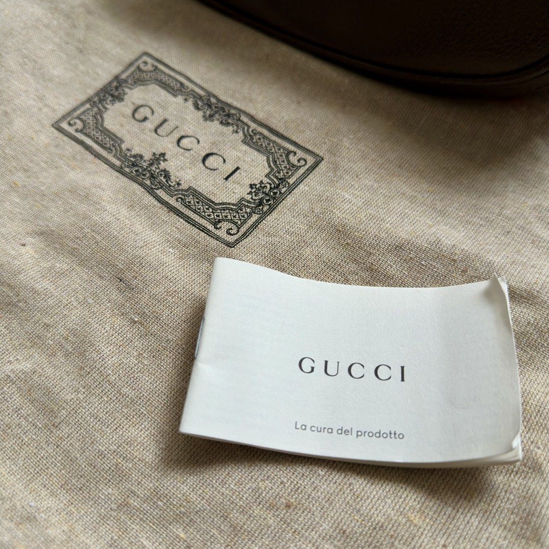 Gucci Ophidia Bag (Category: Luxury Bags & Wallets) located in Makati City. Submitted by capt_les (Listing ID 1449674387, Image 3). Description: VERY NEGOTIABLE - Authentic Gucci bucket bag - Classic GG monogram canvas - Brown leather trim - Iconic green and red web stripe detail - Drawstring closure with tassel - Adjustable shoulder strap - Comes with dust bag and booklet - Shipping care of buyer.