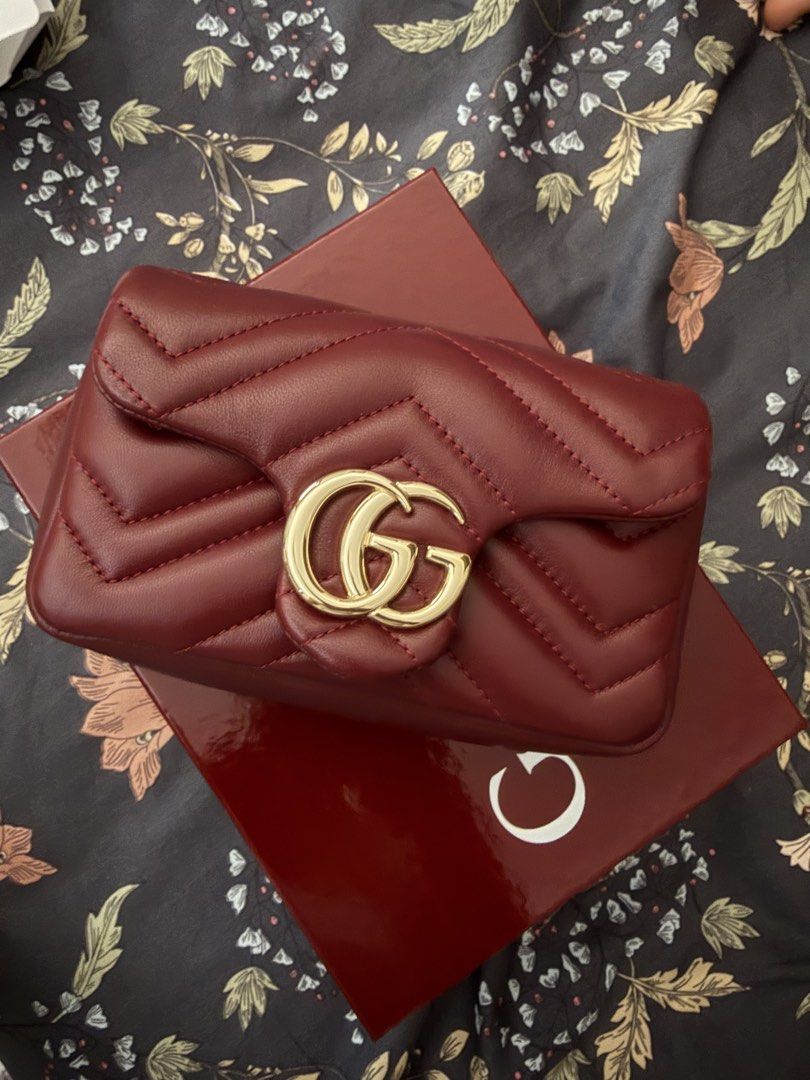 Gucci Super Mini Marmont Bag (Category: Luxury Bags & Wallets) located in Bocaue. Submitted by arnssss (Listing ID 1449608270, Image 2). Description: Rosso ancora color (wine red). Used once only. 100% authentic. Bought from Europe. RFS: letting go of my mini bags.