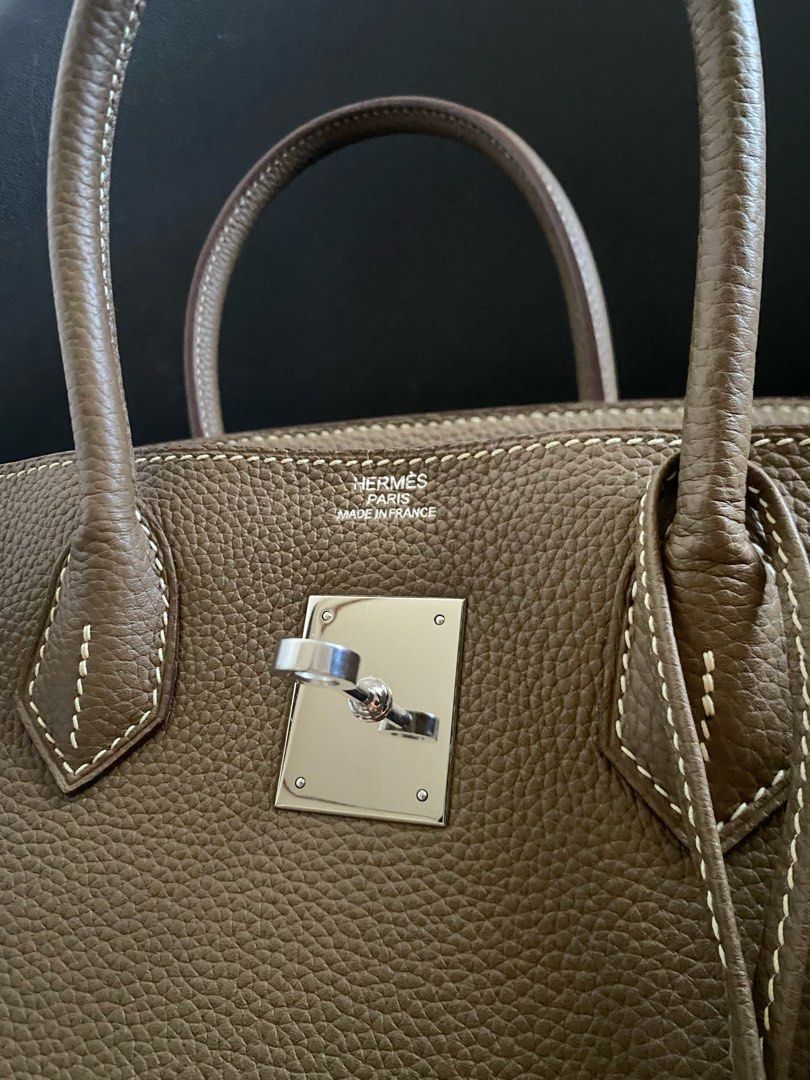 Hermes Birkin 30 Taupe (Category: Luxury Bags & Wallets) located in Las Pinas. Submitted by harper_preloved (Listing ID 1449573224, Image 3). Description: - Birkin size 30 - Color: Taupe - Leather: Togo leather - Hardware: Palladium - Includes: Dust bag .
