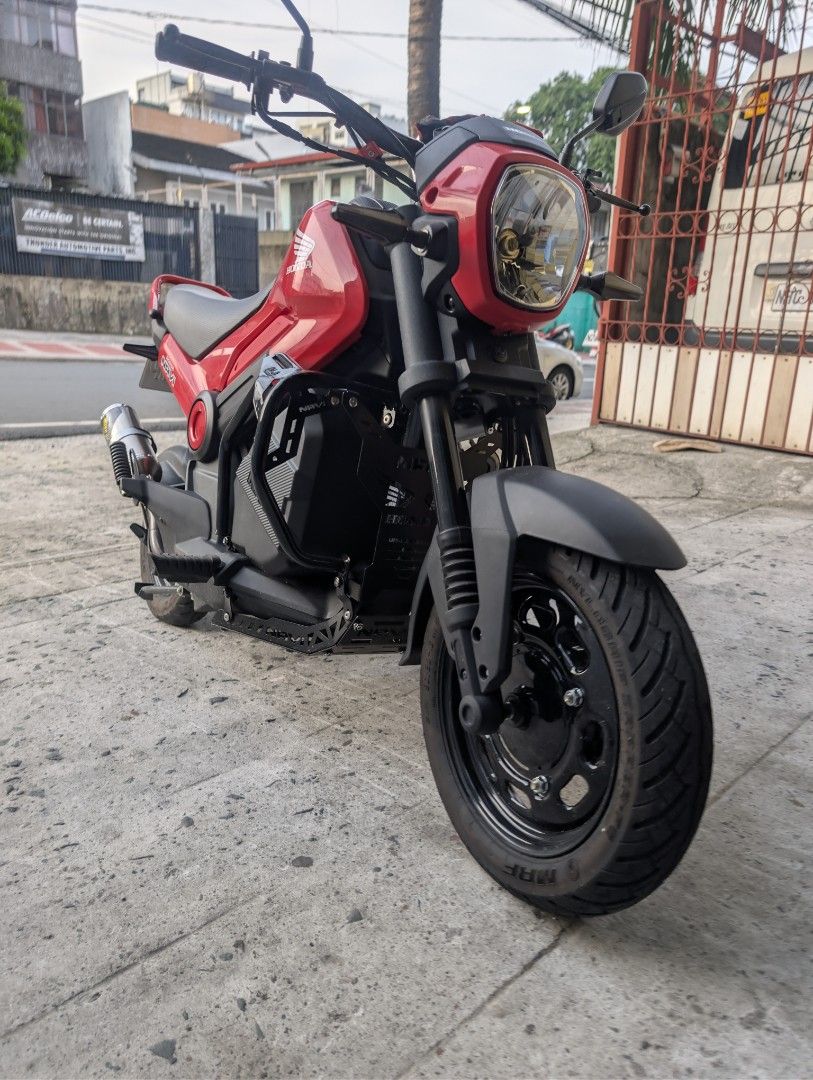 Honda Navi Red Custom Exhaust & Handlebars (Category: Other Motorcycles Parts and Accessories) located in Quezon City. Submitted by boldearth_664825 (Listing ID 1449685938, Image 1). Description: Honda Navi Red 400+ odo only Pass as brandnew With accesories Original GTR Handle Bar Icon sequential signal lights front and rear Ac to dc concerted already Revolution tail tidy Norifumi Offroad Muffler with custom elbow Red motoshield Crash Guard Red m