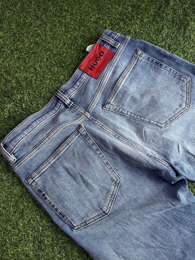 Hugo Boss Light Wash Denim Pants (Category: Jeans) located in Calapan. Submitted by seria_thrifting_apparel (Listing ID 1449702970, Image 2). Description: ✅Complete lags • Width: 34-38 • Length: 38.5 • Hem: 7 • Color rate: 9/10 • Issue: None (Excellent Condition).