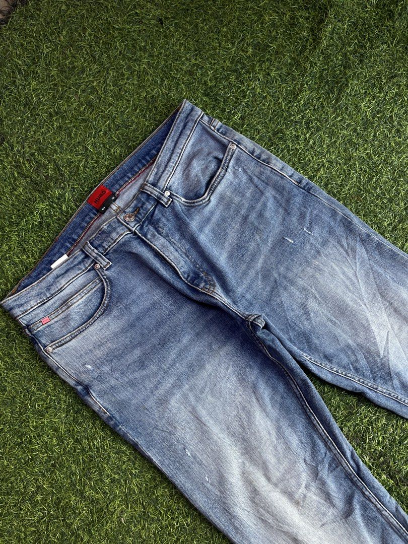 Hugo Boss Light Wash Denim Pants (Category: Jeans) located in Calapan. Submitted by seria_thrifting_apparel (Listing ID 1449702970, Image 3). Description: ✅Complete lags • Width: 34-38 • Length: 38.5 • Hem: 7 • Color rate: 9/10 • Issue: None (Excellent Condition).