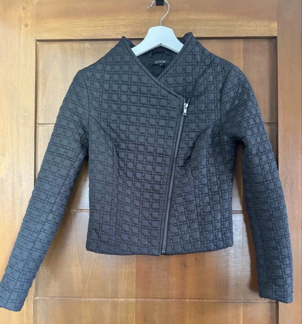 Iconic Quilted Moto Jacket (Category: Coats, Jackets and Outerwear) located in Paranaque City. Submitted by panmakes (Listing ID 1449730376, Image 1). Description: - Iconic black quilted jacket - Cropped length with long sleeves - Asymmetrical zip front - Stand-up collar - Versatile for layering or standalone wear - Sharp and modern look.