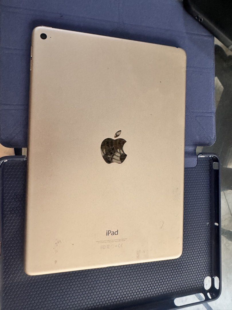 Ipad Air 2 64gb Gold (Category: iPad) located in Quezon City. Submitted by cb_glam22 (Listing ID 1449586823, Image 2). Description: - For Sale: iPad Air 2 - Storage: 64GB - Color: Gold - Condition: Very Good - Features: - Replaced LED - Fully tested & working - Smooth performance - Clean & well-maintained - Tempered glass installed - Inclusions: - iPad Air 2 (Gold, 64GB) - Case - Tempered Glass - Meetup Location: SM Grand Central.