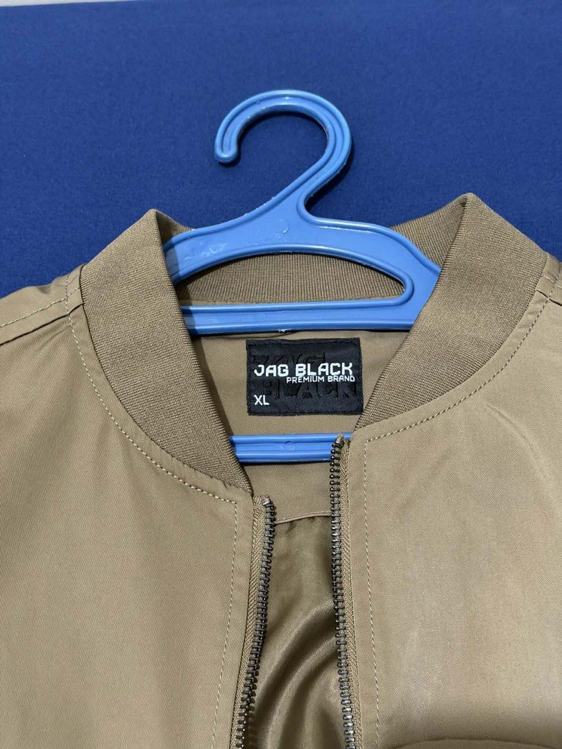 JAG BLACK Premium Brand Bomber Jacket XL (Category: Coats, Jackets and Outerwear) located in Manila. Submitted by lemueljohn (Listing ID 1449545963, Image 2). Description: For Sale: Jag Men's Moto Fit Bomber Jacket ( Brown ) Size: Extra Large ( XL ) | See image included Condition: Used - Like New ( Only used once ) RFS: No longer need 🏷️ ₱ 1,500 ( slight nego, original price from JAG ₱ 2,000 ) 📍 La Grandeza, Pagrai, Antipolo.