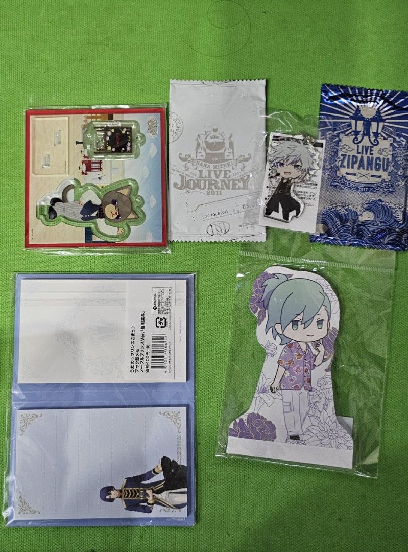 Kids Aniks - J-Pop Anime Merchandise Bundle - SET E (Category: Vintage Collectibles) located in Baguio. Submitted by bitsbaguio (Listing ID 1449634405, Image 3). Description: - Bundle of various anime merchandise - Includes large posters featuring male characters in elaborate outfits - Comes with smaller acrylic standees and pins - Also includes a yellow pouch - Some items are still in original packaging - Great for any anime fan and collector Gr
