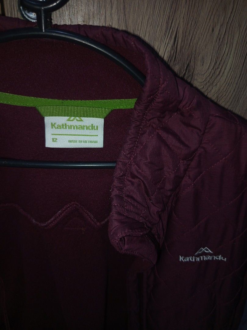 Kathmandu Quilted Fleece Lined Jacket (Category: Coats, Jackets and Outerwear) located in Cabuyao City. Submitted by kookienixx (Listing ID 1449576254, Image 2). Description: Maroon Kathmandu jacket. Quilted front with fleece lining. Full zip closure. Great for layering or as a light outer layer. Size 12. For decluttering..