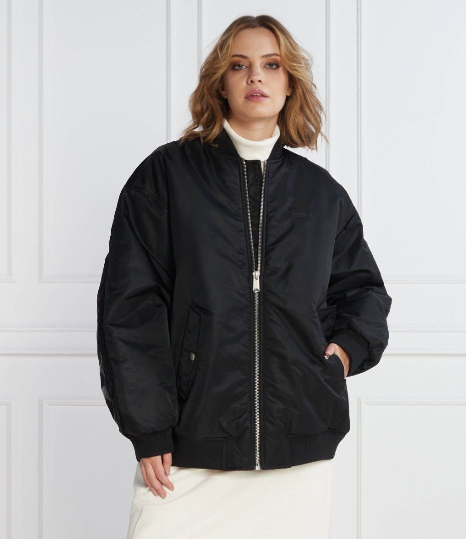 LARGE UNISEX Black Oversized Bomber Windbreaker Jacket (Category: Coats, Jackets and Outerwear) located in Caloocan City. Submitted by saramedeclutter (Listing ID 1449635714, Image 1). Description: - Classic black bomber jacket - Oversized fit for a relaxed look - Zip-up front - Two side pockets - Ribbed cuffs and hem - Ideal for layering - Versatile wardrobe staple outer shell: windbreaker material with inner lining (not padded) can be unisex fo