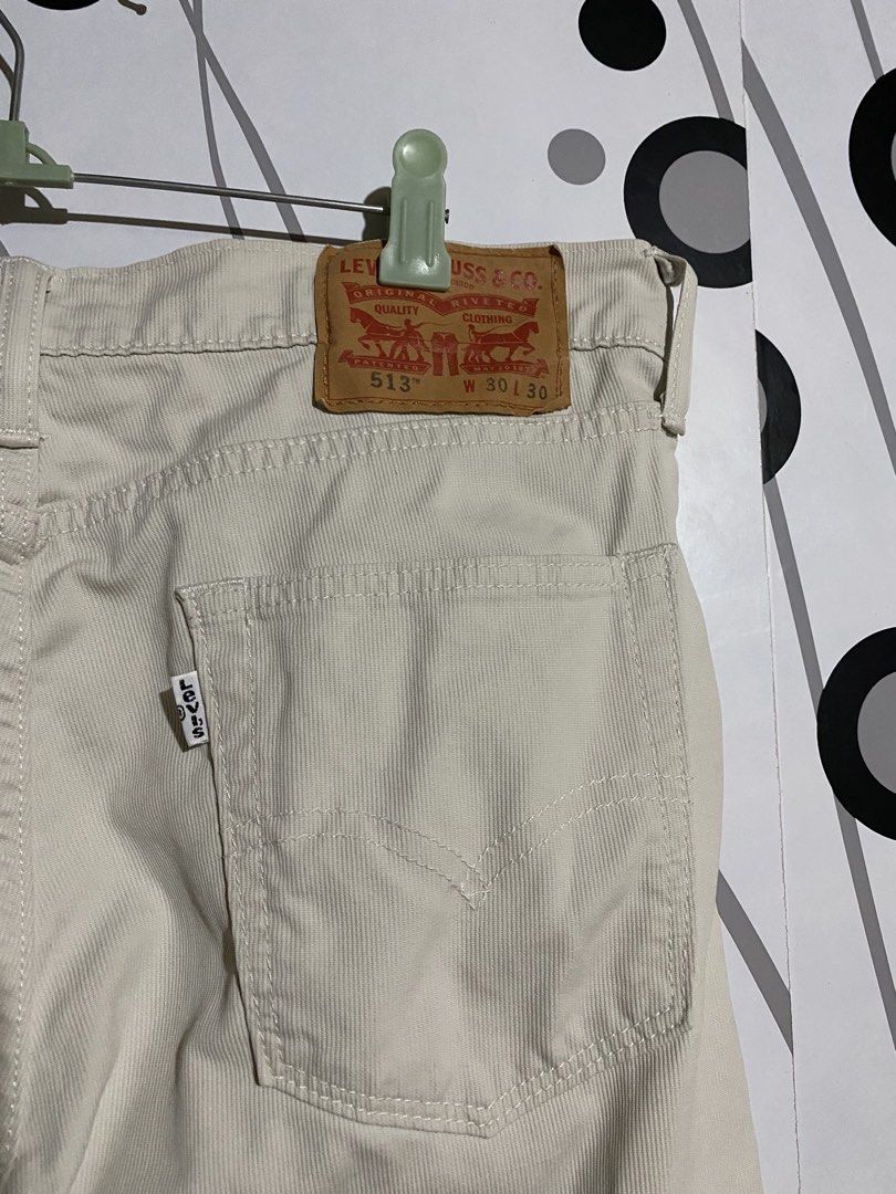 Levi's 513 corduroy jeans (Category: Jeans) located in Cebu City. Submitted by patspickph (Listing ID 1449586860, Image 2). Description: These are Levi's 513 corduroy jeans in a light beige color, featuring a classic leather back patch.Style: Levi's 513 (Slim Straight fit). Material: Beige corduroy fabric. Size: 30-32(max) inch waist and 38.5 inch length. As new Excellent Condition👌.