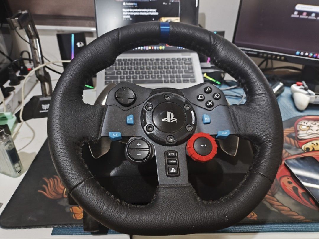 Logitech G29 Driving Force (Category: Controllers) located in Paranaque City. Submitted by i4md4n (Listing ID 1449649291, Image 2). Description: Logitech G29 Driving Force Wheel and pedals for PC and Playstation Seldom used so decided to sell Ung wire ng pedals has a small chip kaya tinakpan ko ng electrical tape but hindi siya putol may tapyas lang ng konti ung rubber. Other than that no issues All working fine. Can provide a video to show na wo