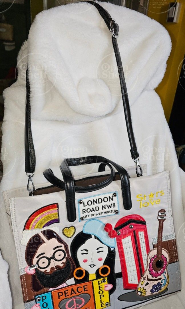 London Embroidery Tote Bag w/ Adjustable Strap (Category: Tote Bags) located in Baguio. Submitted by openshelf_findsph (Listing ID 1449577944, Image 2). Description: ‼️PLEASE READ 😊 Condition: Slightly used, with no damages or major flaws. Only needs cleaning in a few areas. ✨️ Features a vibrant 1960s London-inspired design ✨️ Stylish tote bag with spacious storage ✨️ Made from durable premium nylon canvas and textile materials ✨️ Reinforced ve