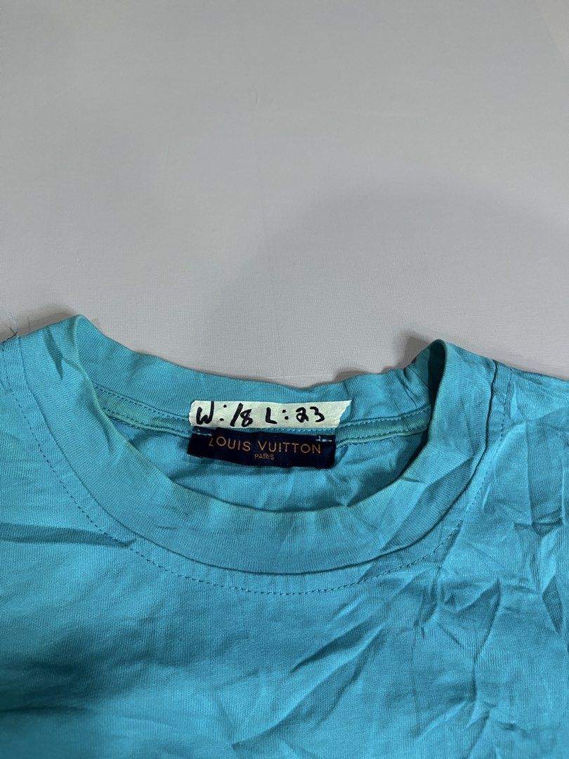 Louis Vuitton Blue Monogram T-Shirt (Category: Luxury Apparel) located in Mabalacat. Submitted by aas_thriftfings (Listing ID 1449681388, Image 3). Description: - Cool blue Louis Vuitton t-shirt - Classic LV monogram embroidered on chest - Tag size: L - Made in Vietnam - Ideal for casual wear.