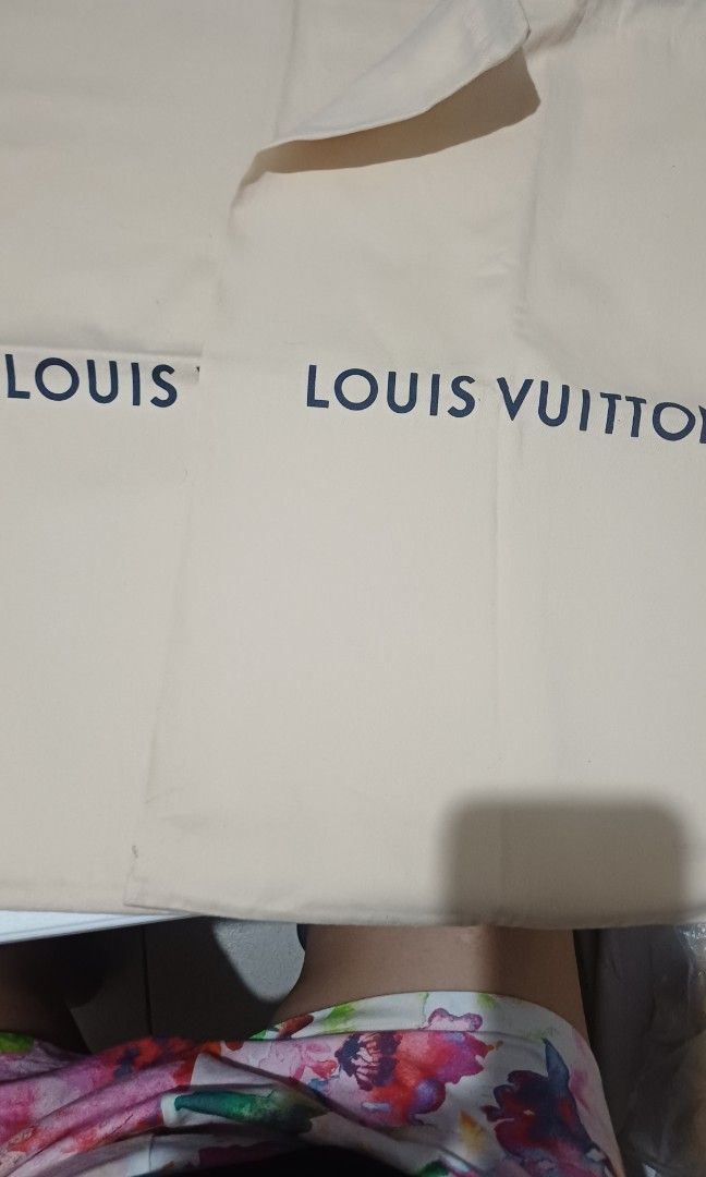 Louis Vuitton Dust Bag 19" x 11" (Category: Luxury Bags & Wallets) located in Rizal. Submitted by jekomy (Listing ID 1448510086, Image 2). Description: - Authentic Louis Vuitton dust bag - Dimensions: 19 inches (height) x 11 inches (width) price per piece 2pcs available - Ideal for protecting luxury handbags, shoes, and other valuables - Keeps items safe and dust-free during storage.