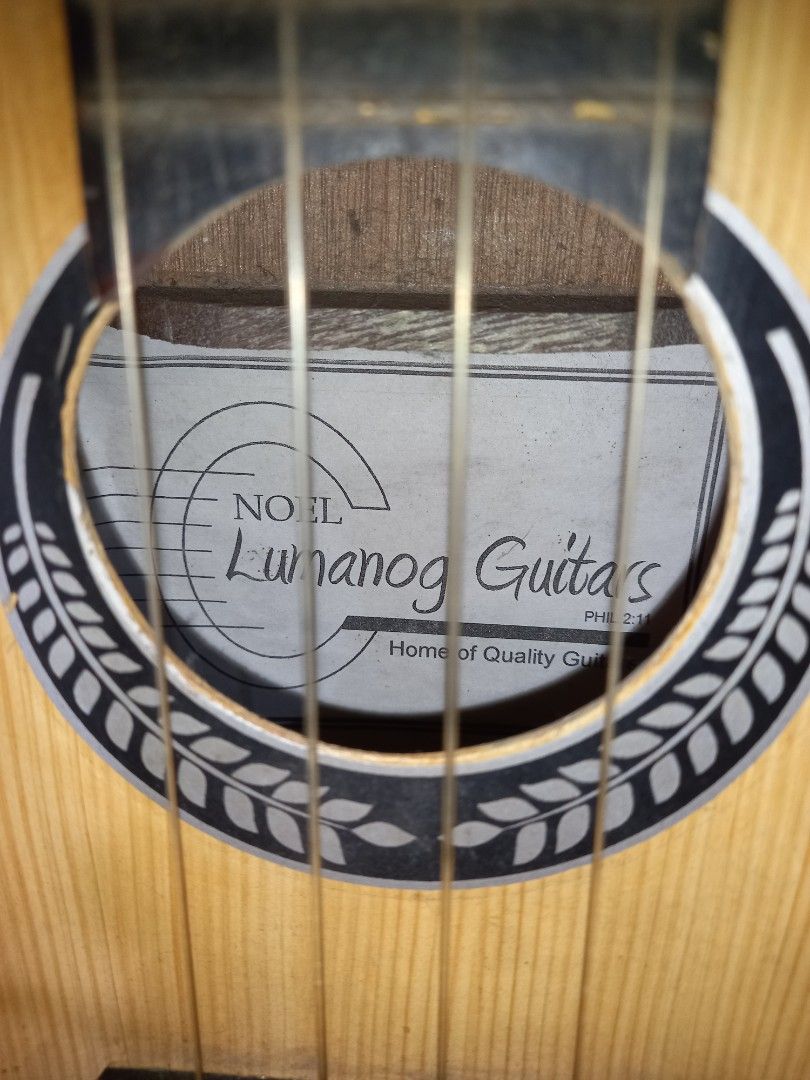 Lumanog Tenor Ukulele (Category: Musical Instruments) located in Taguig. Submitted by kaeltiglao (Listing ID 1449597848, Image 2). Description: This is a Noel Lumanog Tenor Ukulele (~69cm /27in) RFS: decluttering and need funds for college Specs: Body: laminated plywood Strings: Last restring was June 2024 (Standard GCEA strings) Note: ❗️There are light scratches all throughout the body and some wood chipping around the seams but it does not affe