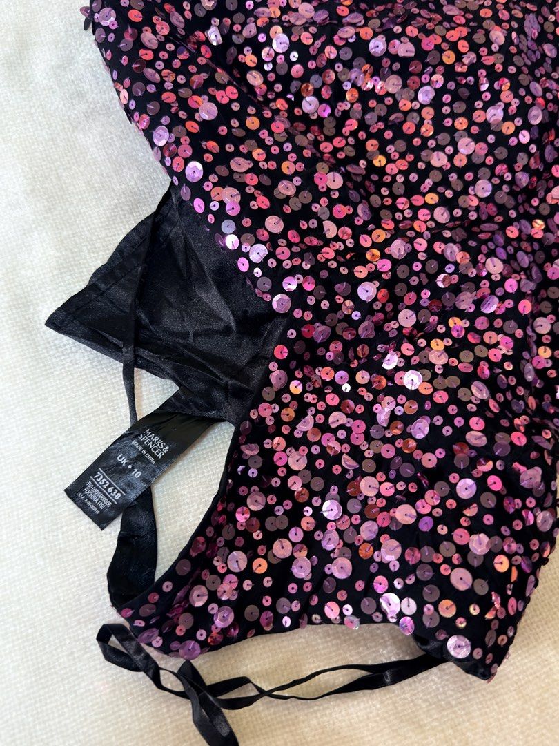 Marks & Spencer Sequin Halter Neck Top (Category: Sleeveless) located in Iloilo. Submitted by hellodindi (Listing ID 1449589763, Image 2). Description: Negotiable! • Criss-cross straps at the back • Ideal for parties or nights out • Size: UK 10.