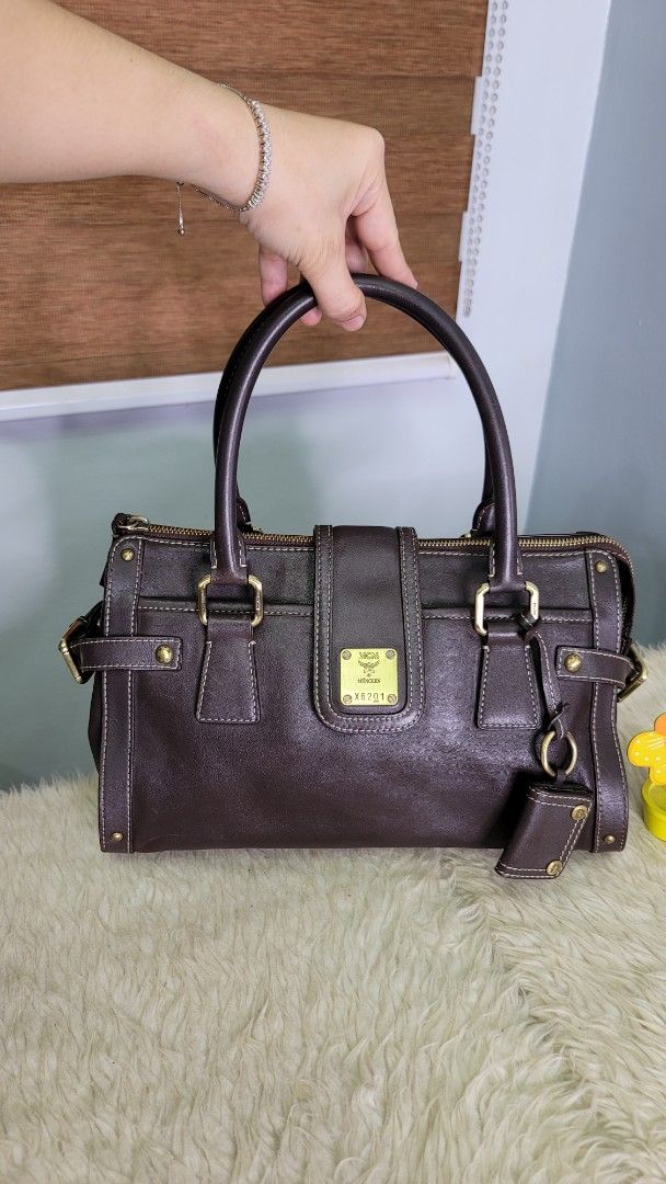 MCM Dark Brown Leather Satchel Handbag (Category: Luxury Bags & Wallets) located in Cavite. Submitted by amairos (Listing ID 1449748040, Image 2). Description: good condition medium size.