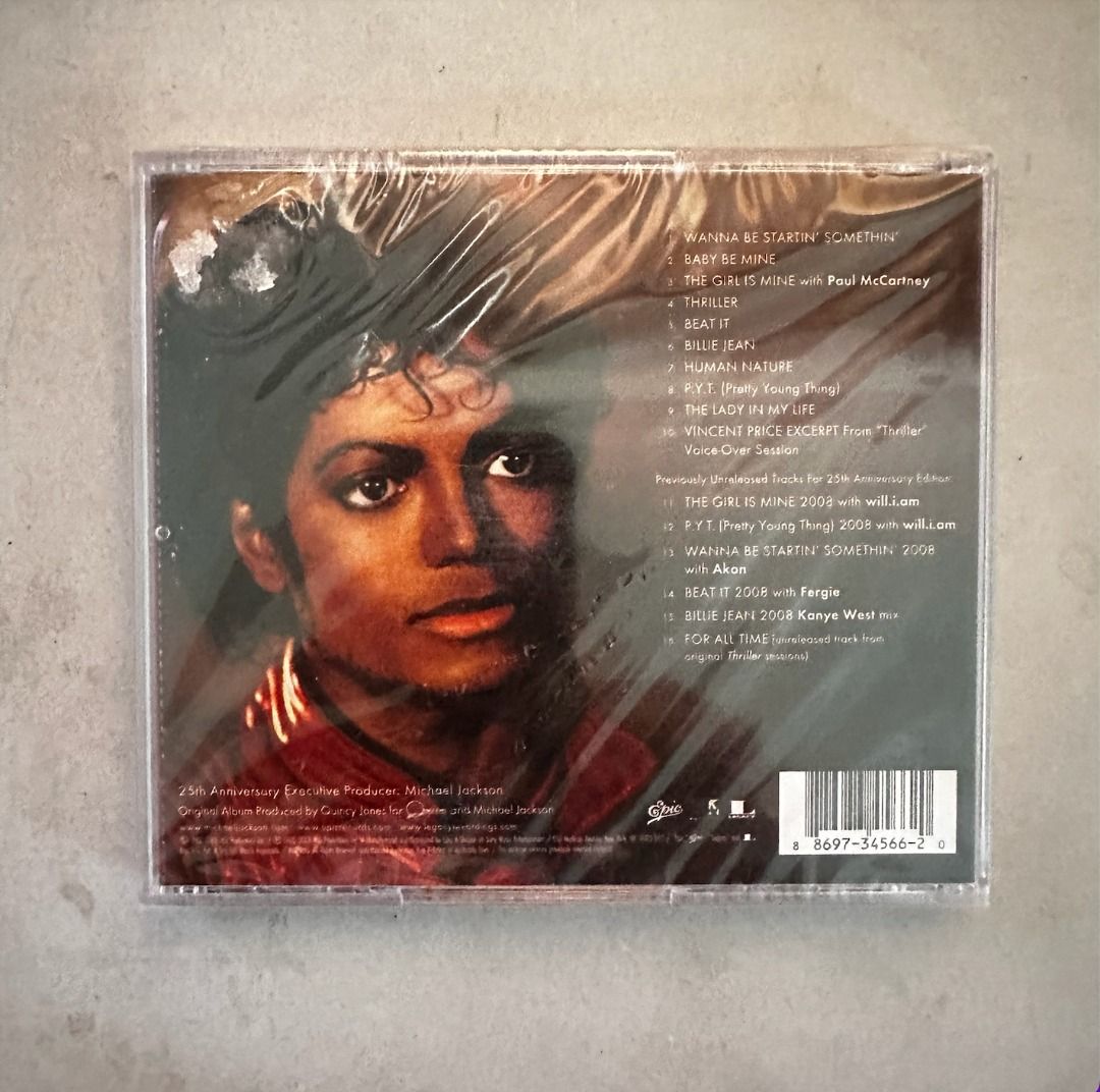 Michael Jackson Thriller 25th Anniversary Edition CD (Category: CDs & DVDs) located in Bulacan. Submitted by mattj12 (Listing ID 1449596682, Image 2). Description: - Michael Jackson's Thriller 25th Anniversary Edition CD - Includes original album tracks - Features previously unreleased tracks from 2008 - Collaborations with Paul McCartney, Akon, Fergie, and Kanye West - Perfect for any Michael Jackson fan - Own this classic album today!.