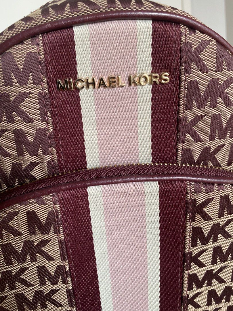 Michael Kors Abbey MD Backpack (Category: Luxury Bags & Wallets) located in Manila. Submitted by jellae (Listing ID 1449625479, Image 2). Description: - Authentic Michael Kors Abbey Backpack - Signature MK print in burgundy and beige - Genuine leather trim - Adjustable straps for comfort - Comes with original tag, with dust bag Used less than 5 times :).