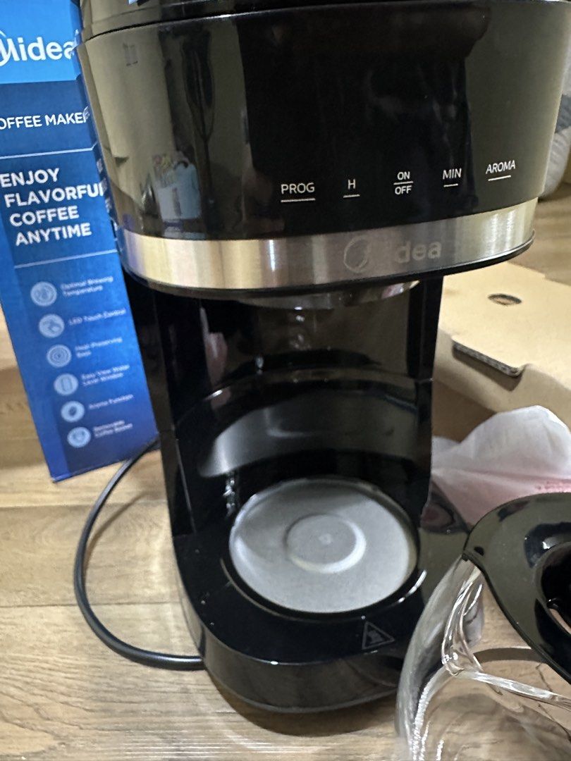 Midea Coffee Maker MA-D1502W2ME (Category: Coffee Machines & Makers) located in Caloocan City. Submitted by happy.chillestarista (Listing ID 1449661880, Image 2). Description: - Midea Coffee Maker for flavorful coffee anytime. - Optimal brewing temperature for perfect taste. - Easy-to-use LED touch control. - Heat-preserving base keeps coffee warm. - Convenient easy-view water level window. - Aroma function for enhanced coffee flavor. - Removable