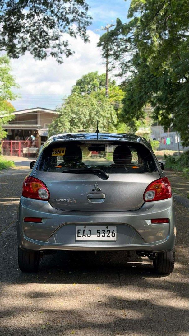 Mitsubishi Mirage Hatchback GLX 2024 (Category: Used Cars) located in Kawit. Submitted by markuzmathers (Listing ID 1449623773, Image 2). Description: 2024 MITSUBISHI MIRAGE HB GLX Like Brand New Condition! ✅ Apple CarPlay / Android Auto ✅ Manual Transmission ✅ Titanium Gray Metallic ✅ Aftermarket wheels ✅ 6,xxx Original Mileage ✅ Complete Tools, Manuals & Legal Docs ✅ Free Use of Scanner ✅ 1-3 DAYS APPROVAL OPTION 1: LOW DOWNPAYMENT DEAL! P30,00