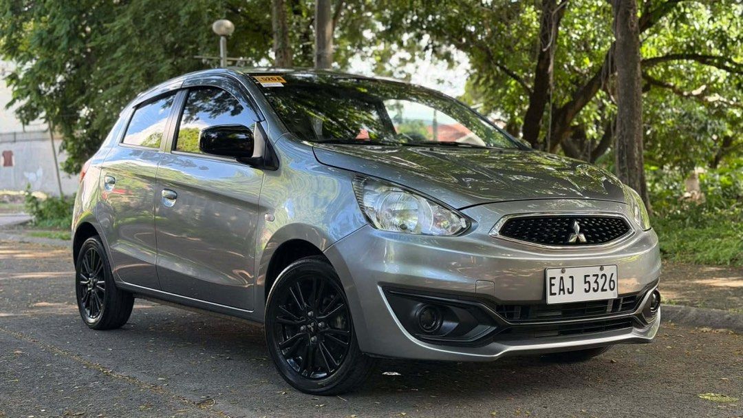 Mitsubishi Mirage Hatchback GLX 2024 (Category: Used Cars) located in Kawit. Submitted by markuzmathers (Listing ID 1449623773, Image 1). Description: 2024 MITSUBISHI MIRAGE HB GLX Like Brand New Condition! ✅ Apple CarPlay / Android Auto ✅ Manual Transmission ✅ Titanium Gray Metallic ✅ Aftermarket wheels ✅ 6,xxx Original Mileage ✅ Complete Tools, Manuals & Legal Docs ✅ Free Use of Scanner ✅ 1-3 DAYS APPROVAL OPTION 1: LOW DOWNPAYMENT DEAL! P30,00