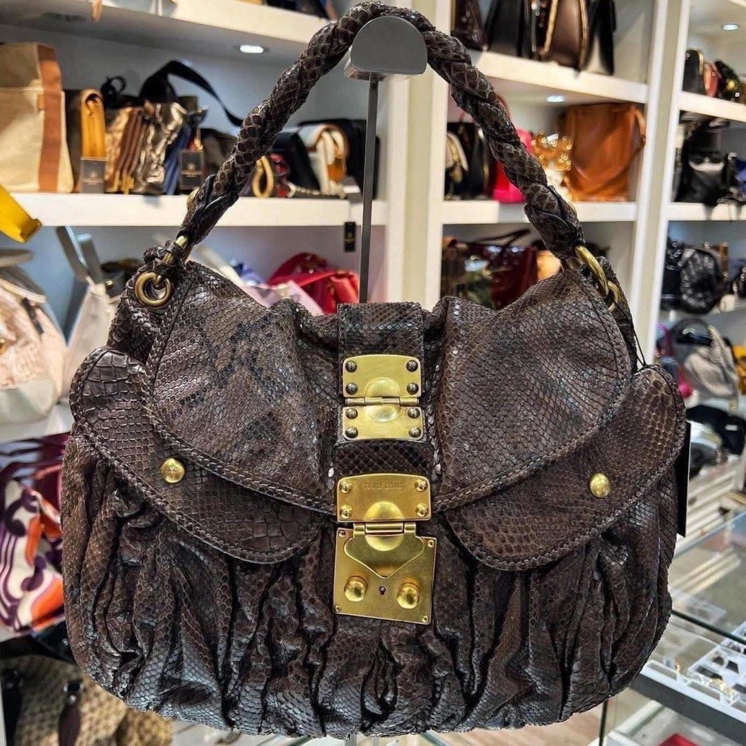 MiuMiu Python Bag (Category: Bags & Wallets) located in Singapore. Submitted by yanholuxury (Listing ID 1449697829, Image 1). Description: Preloved Authentic MiuMiu Python Leather Shoulder Bag $950 VISIT US AT YANHO LUXURY TODAY !!! BUY SELL TRADE WATCHES,LUXURY GOODS ,JEWELLERY BEST PRICES AND VALUATIONS FOR YOU 0% Instalment Payment Plans Available With These Credit Cards UOB 36 mths DBS & POSB 24 mths Maybank 12 mths Ocbc 12 mths Diners 6 mths