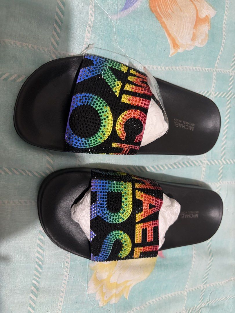 MK SLIDES (Category: Slippers and slides) located in Taytay. Submitted by rinimaha (Listing ID 1449676443, Image 1). Description: Brand new w/o box Bought fr USA.