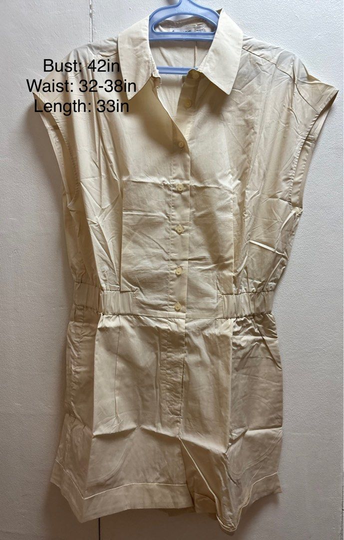 MNG Mango Beige Sleeveless Collared Romper Size M (Category: Rompers) located in Malabon City. Submitted by thriftymanoy (Listing ID 1449590613, Image 1). Description: - Beige sleeveless romper from Mango - Collared neckline with button-up front - Elasticated waist for a comfortable fit - Side zipper closure - Measurements: Bust 42in, Waist 32-38in, Length 33in - Note: Small mark on fabric (see last photo).